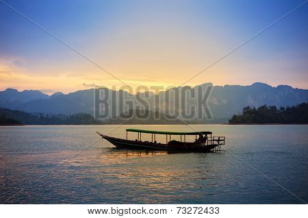 Traditional Thai Long Tail Boat At Sunset, Surat Thani, Thailand