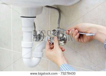 Plumber At Work