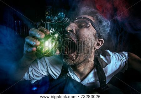 Portrait of a crazy medieval scientist working in his laboratory. Alchemist. Halloween.