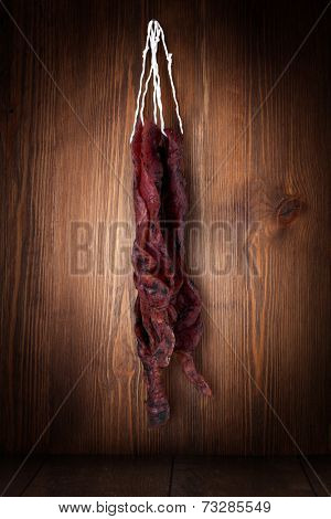jerky beefi on a wooden background