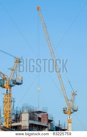 Tower Cranes And Blue Sky