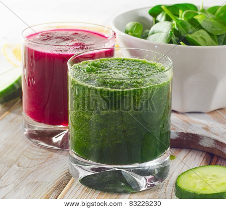 Freshly Squeezed Vegetable Juices On  Wooden Background