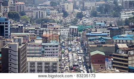 NAIROBI, KENYA-SEPTEMBER 17, 2014: Unidentified crowds go about their business in a busy section of Nairobi, Kenya