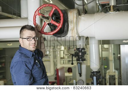 A good serviceman working on a machine room