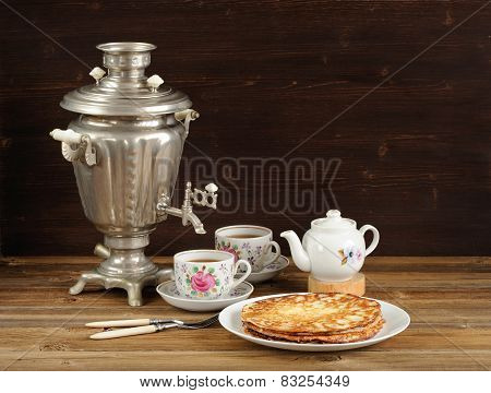 Russian Bliny With Vintage Samovar And Teaware