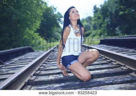 A fashion woman on the railroad train.