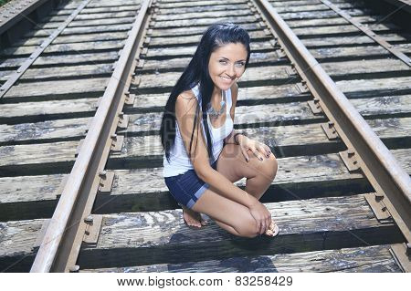 A fashion woman on the railroad train.