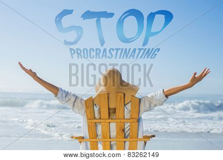 Woman relaxing in deck chair by the sea against stop procastinating