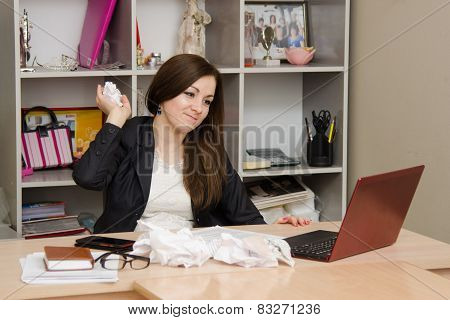 The Girl Is Going To Throw Crumpled Piece Of Paper Into A Computer Screen