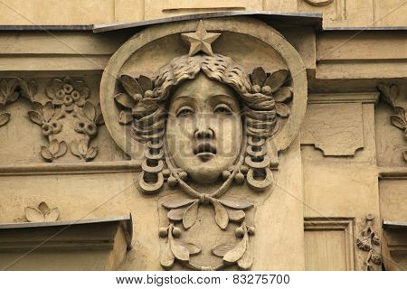 Mascaron on the Art Nouveau building in Prague, Czech Republic.
