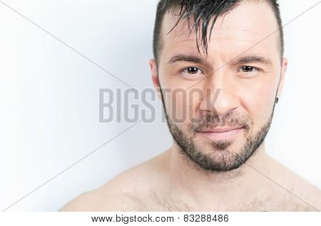 A sexy portrait of a man over a gray background
