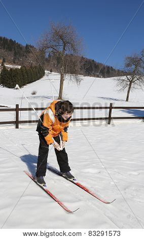 Child For The First Time With Cross-country Skiing