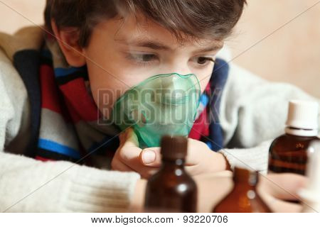 Preteen Boy With Electric Inhaler