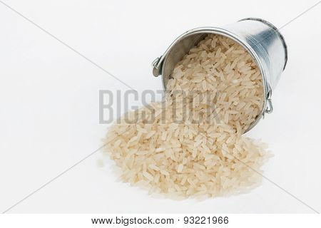 Rice Grains Spilling Out Of Bucket