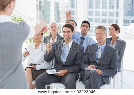 Business people listening during meting in office