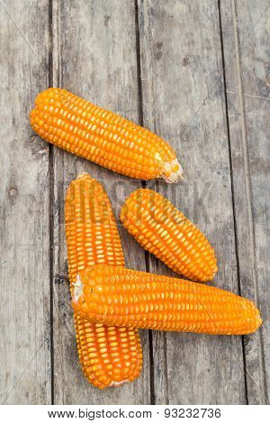 Dried Corn On Old Wooden Background