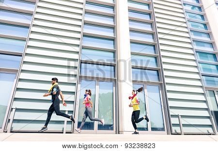 Group Of Young People Running In Modern Urban Area - Fitness Girls Running With Male Trainer Coach