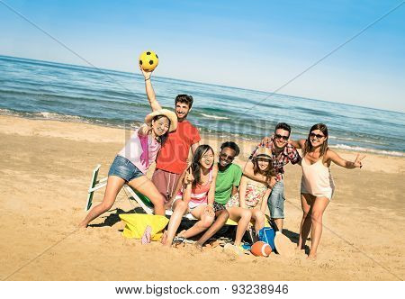 Group Of Multiracial Happy Friends Having Fun With Beach Sport Games - International Summer Concept