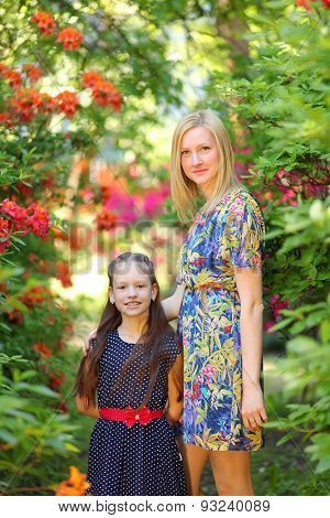 young mother with daughter in park
