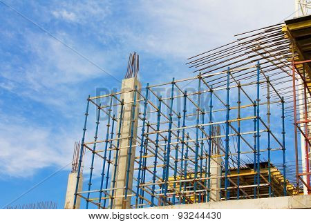 Construction Site Against Blue Sky With Clouds