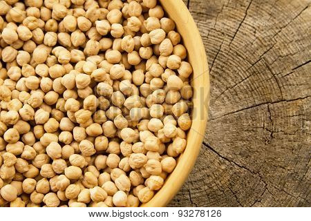 Bunch Of Chickpeas In A Bowl On Old Wooden Background. Indian Cuisine