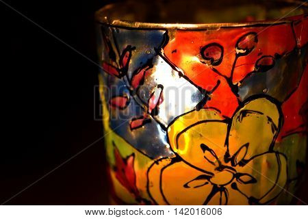 abstract stained glass paint on glass close-up macro
