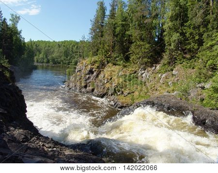 KARELIA, RUSSIA: Kivach waterfall on Suna River - fourth largest plain waterfall in Europe