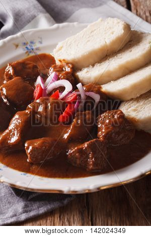 Czech Food: Traditional Goulash With Dumplings Macro. Vertical