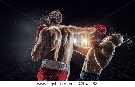 Box fighters trainning outdoor . Mixed media