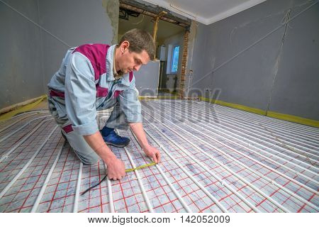 pipefitter installing system of heating