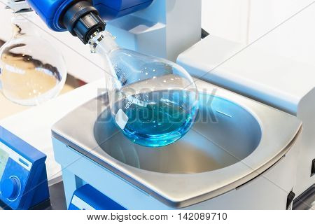 Glass Bulb Rotates In A Laboratory Evaporator.