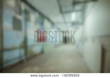 Empty warehouse office or commercial area theme creative abstract blur background with bokeh effect