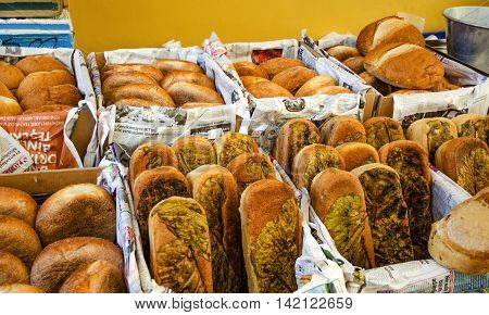 Istanbul Turkey - March 31 2013: Istanbul Balat. Inebolu (Kastamonu) district bazaar. Special leafy kastamonu bread. When compared to other pazar (markets) Kastamonu can seem a little challenging. Like others this market sets up shop on a small street onc