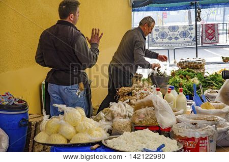 Istanbul Turkey - March 31 2013: Istanbul Balat. Inebolu (Kastamonu) district bazaar. When compared to other pazar (markets) Kastamonu can seem a little challenging. Like others this market sets up shop on a small street once a week every Sunday in Balat.