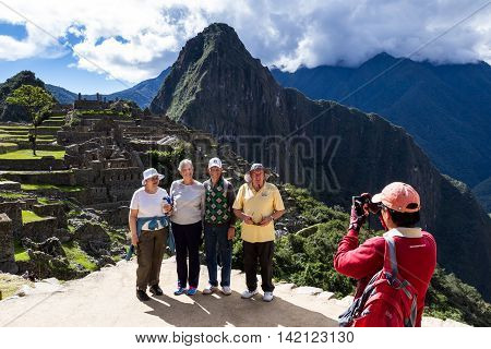 Tourists In Machu Pichu