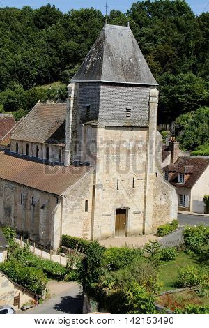 a view of a church in a small village