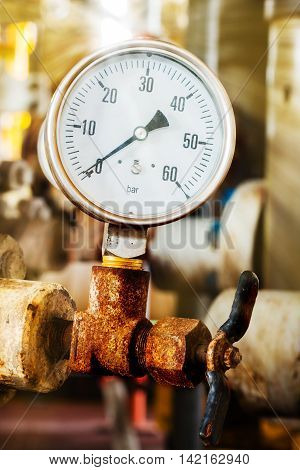Closeup of pressure gauge install at the flowline
