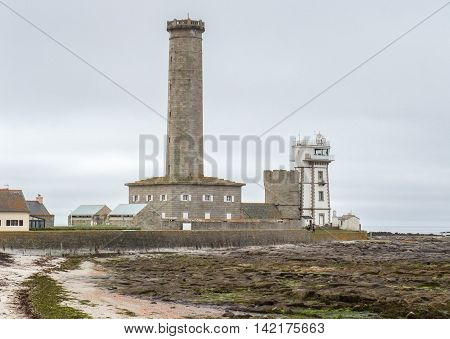 coastal scenery with lighthouse around Penmarch in the Finistere department of Brittany in France