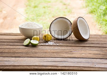 Raw material for food and dessert.Lemon and coconut  and Sticky rice on old wooden background outdoor.Raw material Asia food.Raw material Indian food6