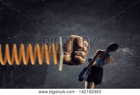 She is determined to fight . Mixed media