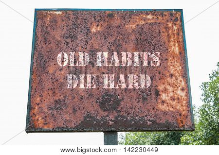 Old habits die hard text message on the board.