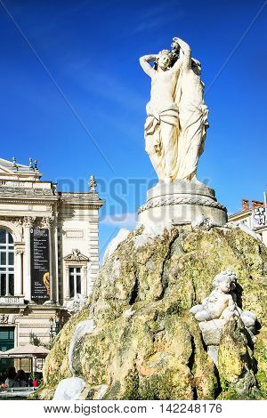 MONTPELLIER, FRANCE - MAY 27 2014: National Opera theater of Montpellier with three Graces fountain. (Built in the Italian style in 1888 ) on May 27 2014 in Montpellier France