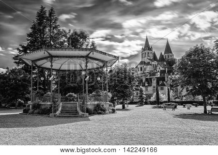 Collegiate Church Saint-Ours Loches of Loches (France). Founded between 963 and 985. View from city park with bandstand