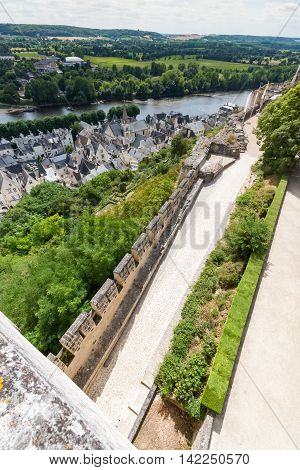 Chinon walled castle. Chinon is a commune located in the Indre-et-Loire department in the Region Centre. The Loire Valley with its castles is UNESCO World Heritage Site France