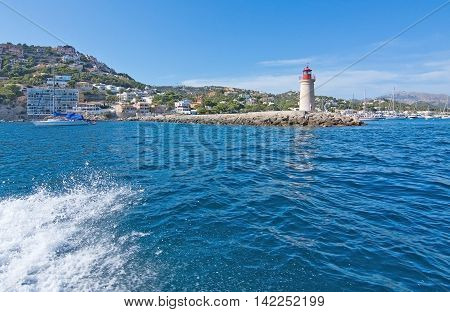 Inlet With Lighthouse