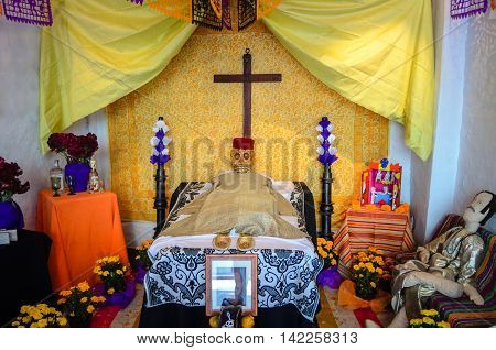 CUERNAVACA / MEXICO - OCTOBER 31 2013: Day of the Dead Altar shown in the Brady Museum of Cuernavaca for the festivities season.