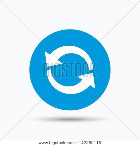 Update icon. Refresh or repeat symbol. Blue circle button with flat web icon. Vector