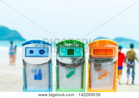 Recycling bins on a blurred background with sky background beach ecology.