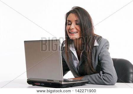 Young beautiful young woman working with laptop