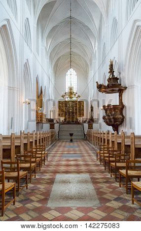 Odense, Denmark - July 21, 2015: The nave of the gothic St. Canute's Cathedral